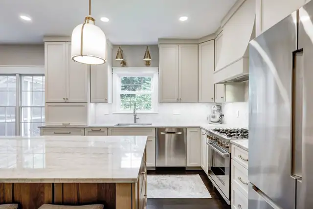 Kitchen remodel in Hershey, PA with a new island, added countertop space and new lighting