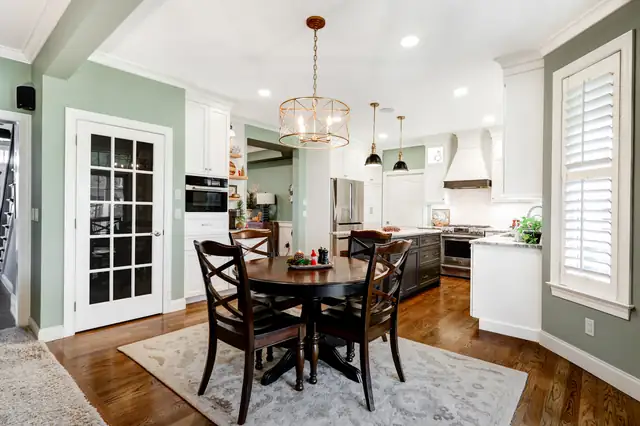 Kitchen remodel in Lititz, PA with a quartz island and a small dining table